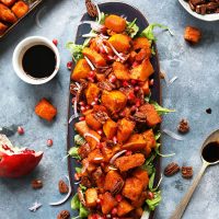Tray of our Sweet and Spicy Roasted Squash Salad topped with Cinnamon Sugar Pecans