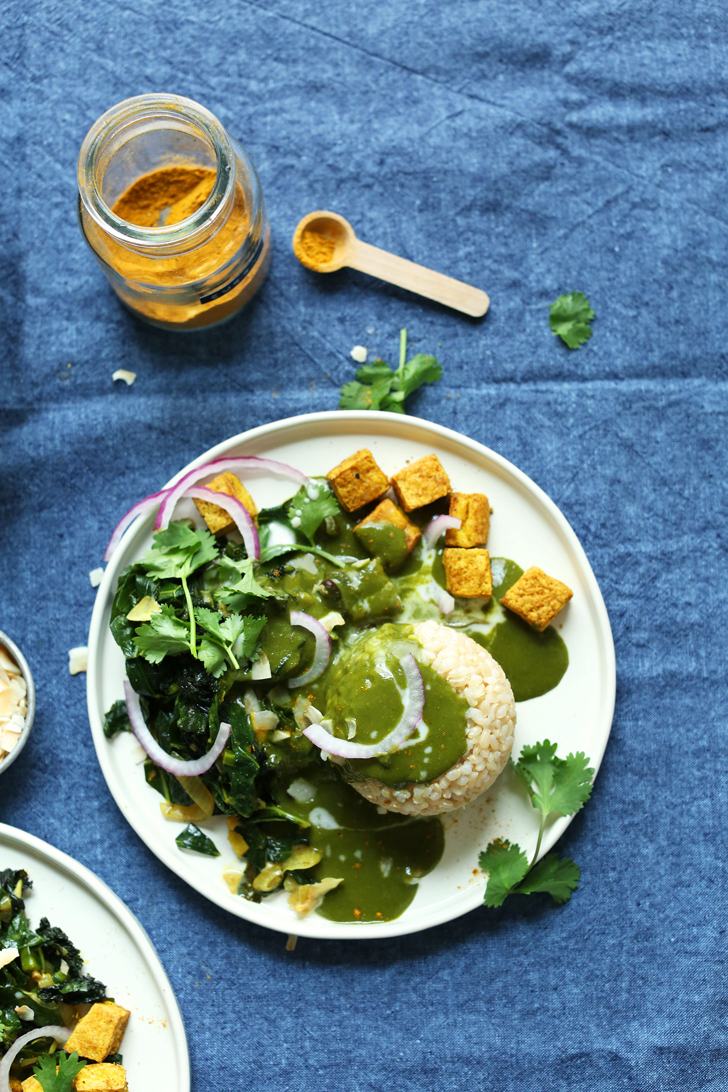 Top view of a plate of vibrant amazing Green Curry with tons of greens