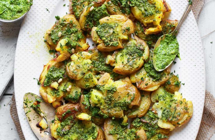 Platter full of Smashed Potatoes with Garlic Herb Pesto for an amazing vegan side dish