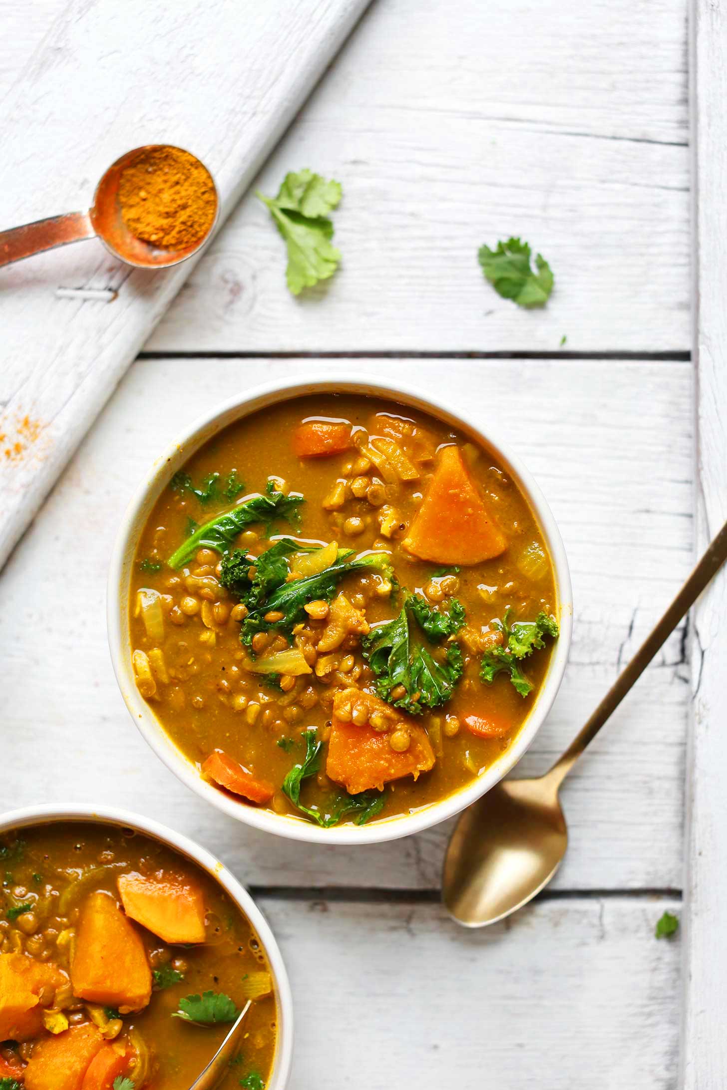 Close up shot of a bowl of our easy homemade curry lentil soup recipe