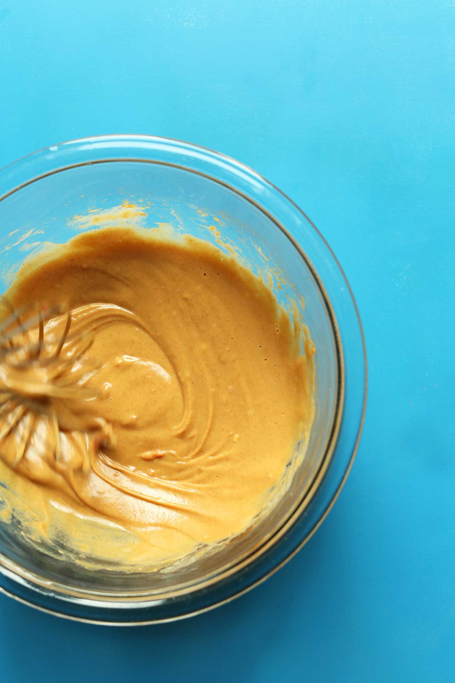 Whisking together ingredients for our gluten-free vegan Spicy Peanut sauce