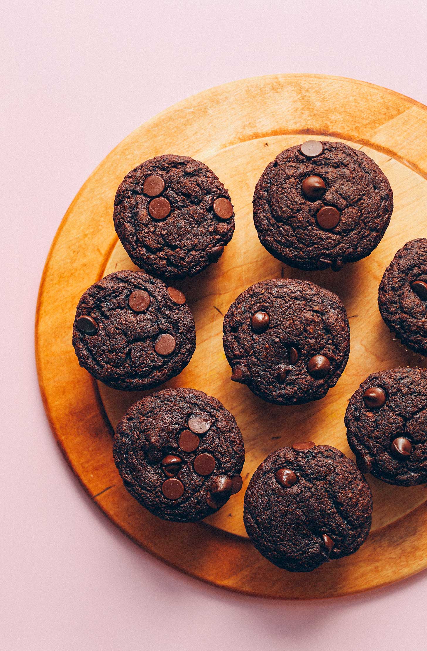 Cutting board full of 1-Bowl Vegan Chocolate Muffins