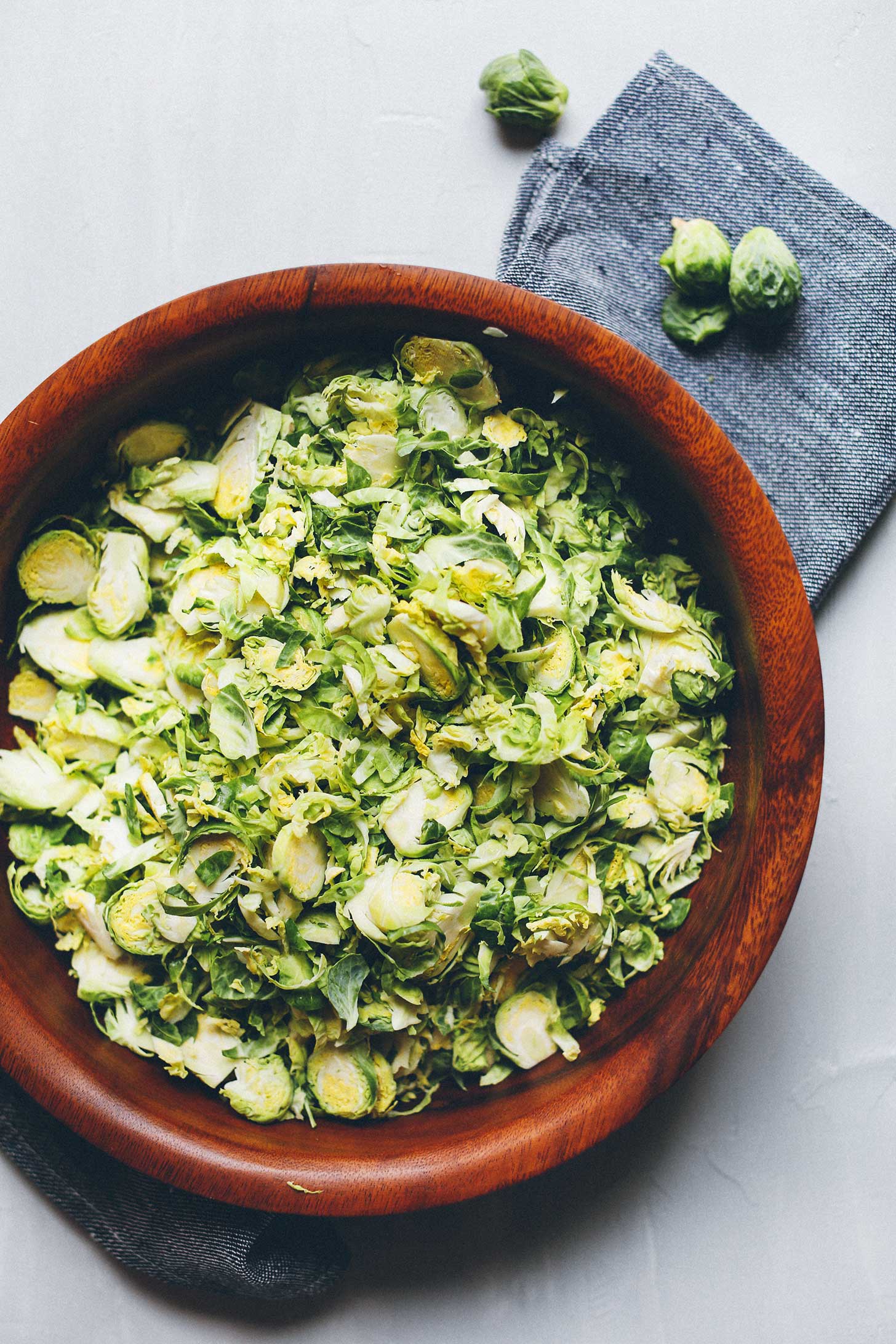 Freshly chopped Brussels Sprouts for a healthy vegan slaw