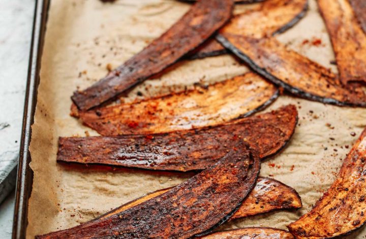 A baking sheet full of the ultimate vegan bacon alternative- Crispy Eggplant Bacon