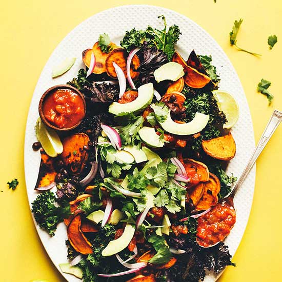 Kale Chip NACHOS with Black Beans, Sweet Potatoes and Avocado! A 30 minute #plantbased #glutenfree meal! #vegan #nachos #kale