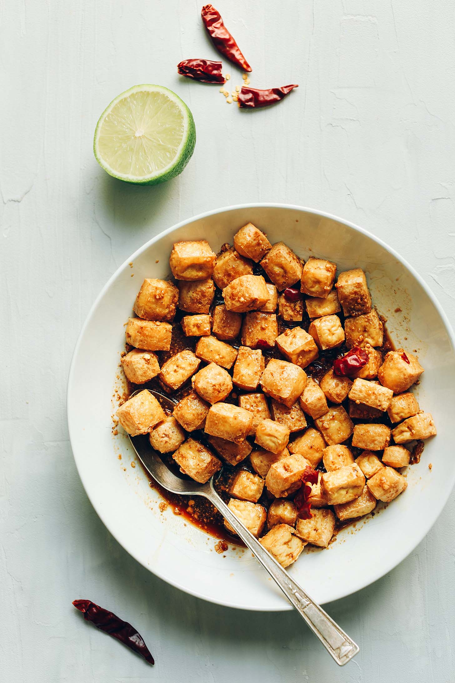 Marinating cubes of tofu for Almond Butter Tofu Stir-Fry