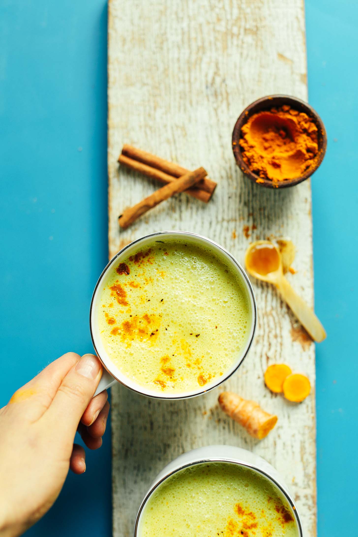 Grabbing a mug of our gluten-free vegan Golden Milk Latte for an anti-inflammatory afternoon treat