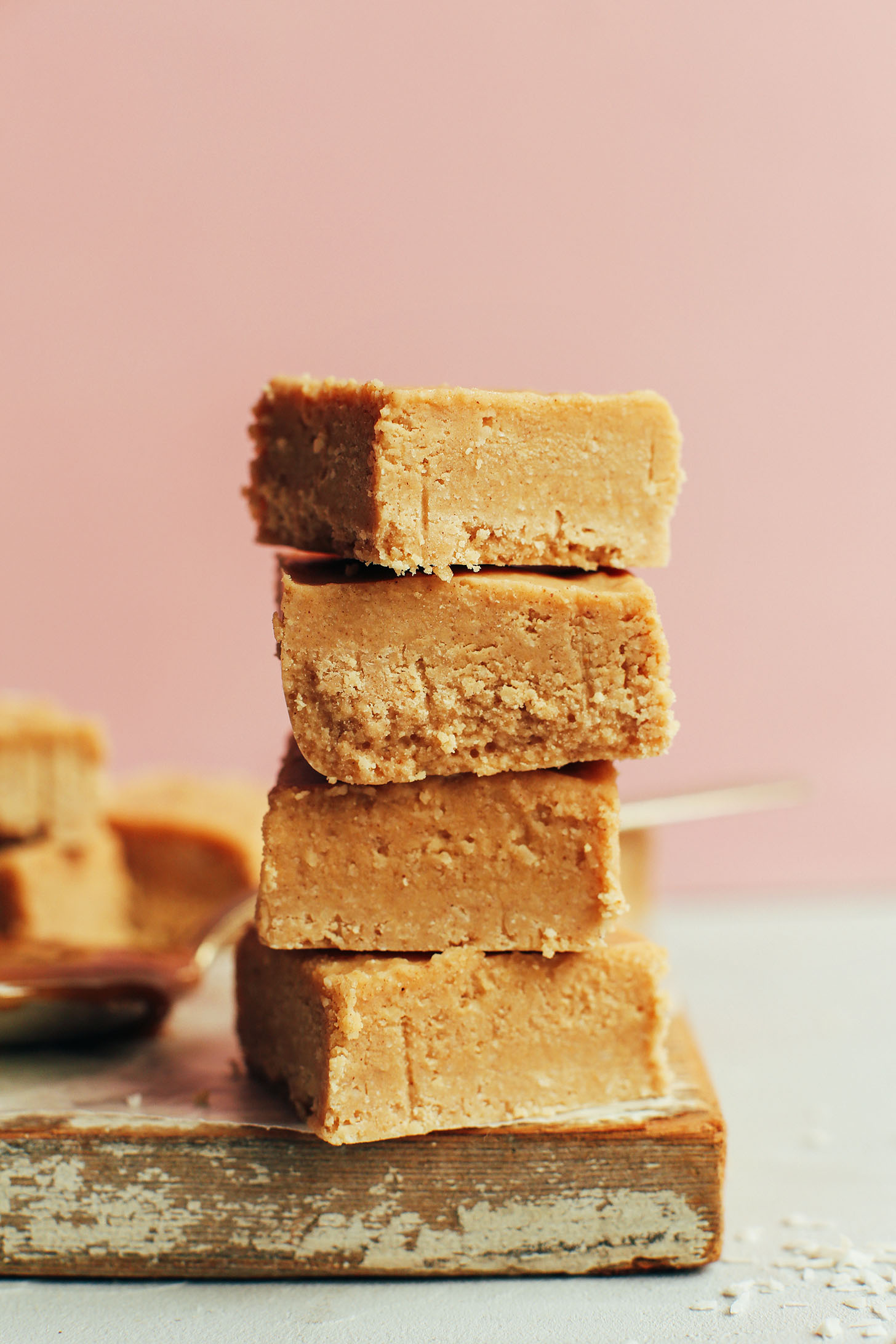 Stacked squares of healthy 4-Ingredient Peanut Butter Fudge that is naturally sweetened