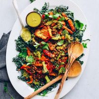 Platter of our Lentil Curry Salad made with Kale, Roasted Veggies, and Green Curry Dressing