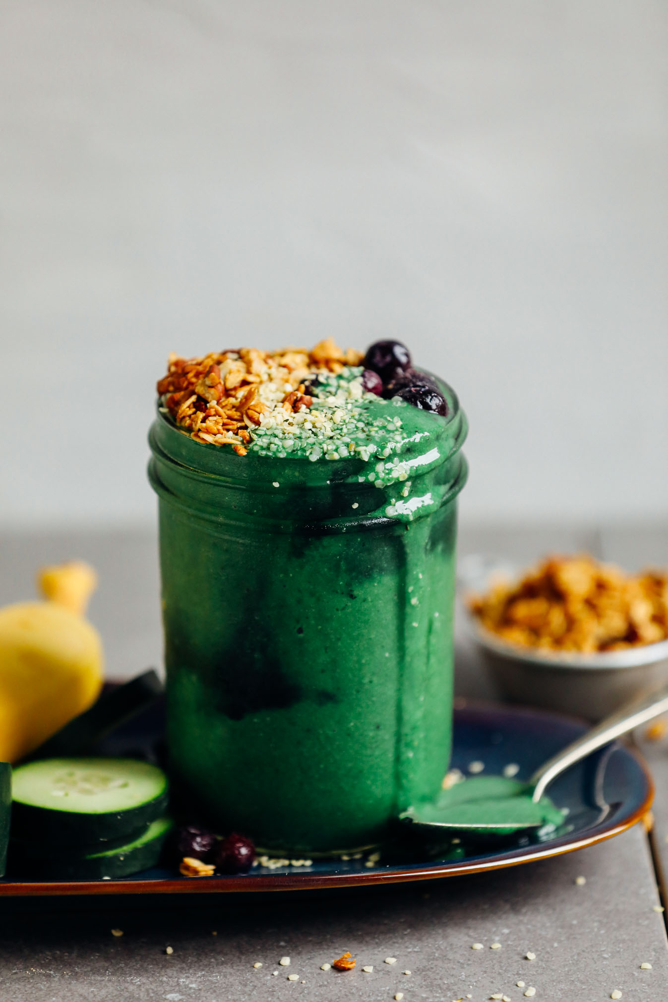 A mason jar filled with our healthy Super Green Spirulina Smoothie