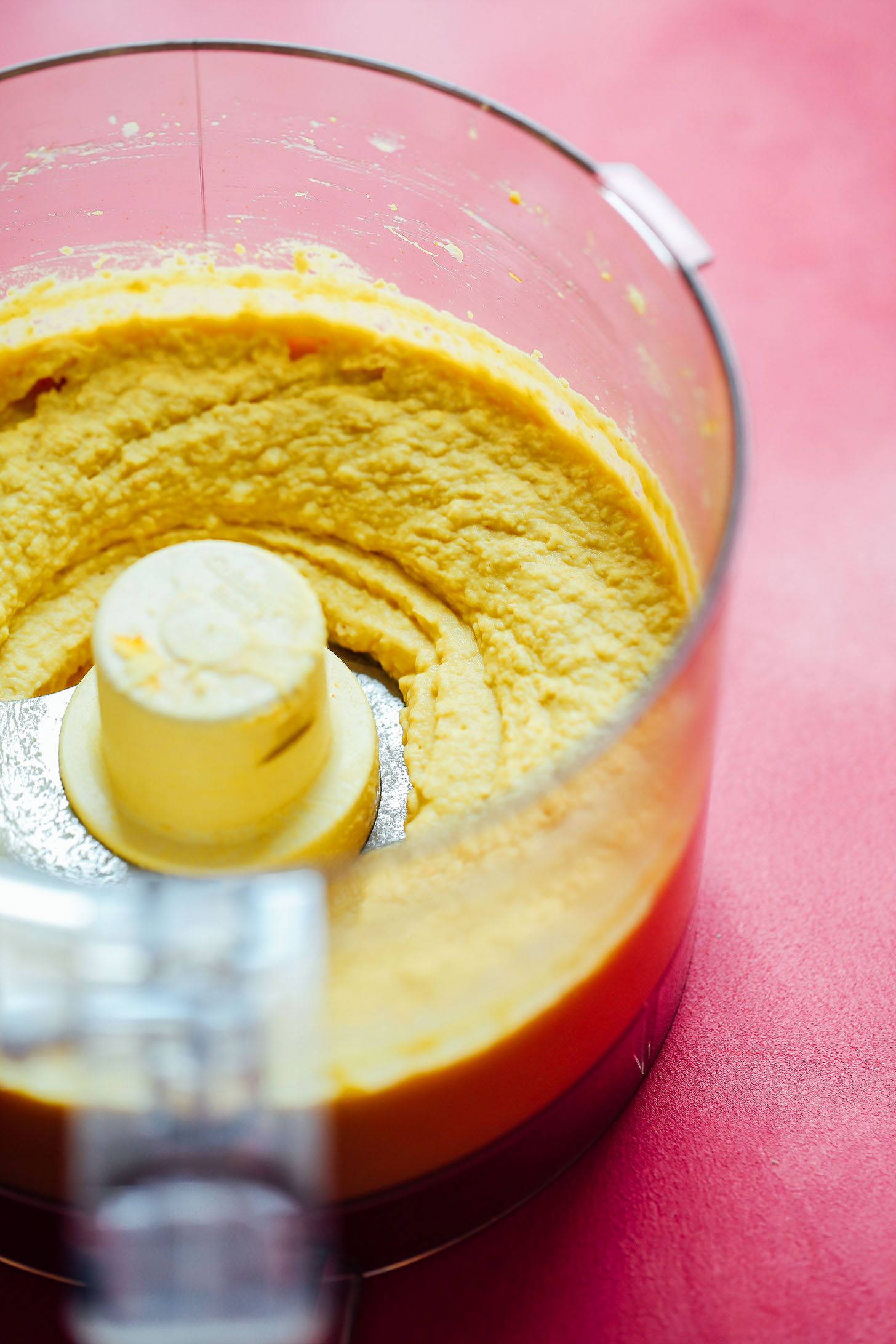 Food processor containing our homemade Golden Goddess Hummus recipe