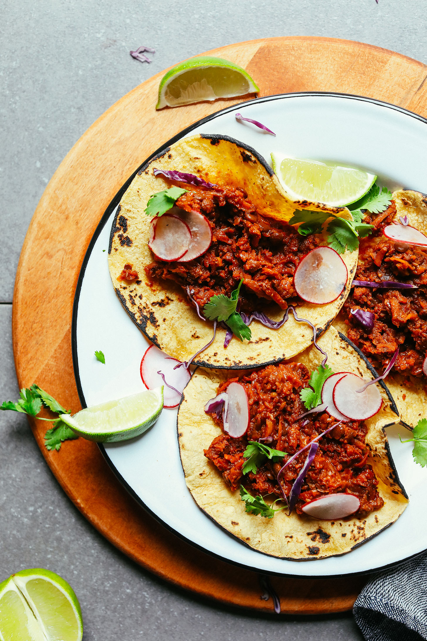Plate of healthy plant-based tacos made with our Vegan Barbacoa recipe