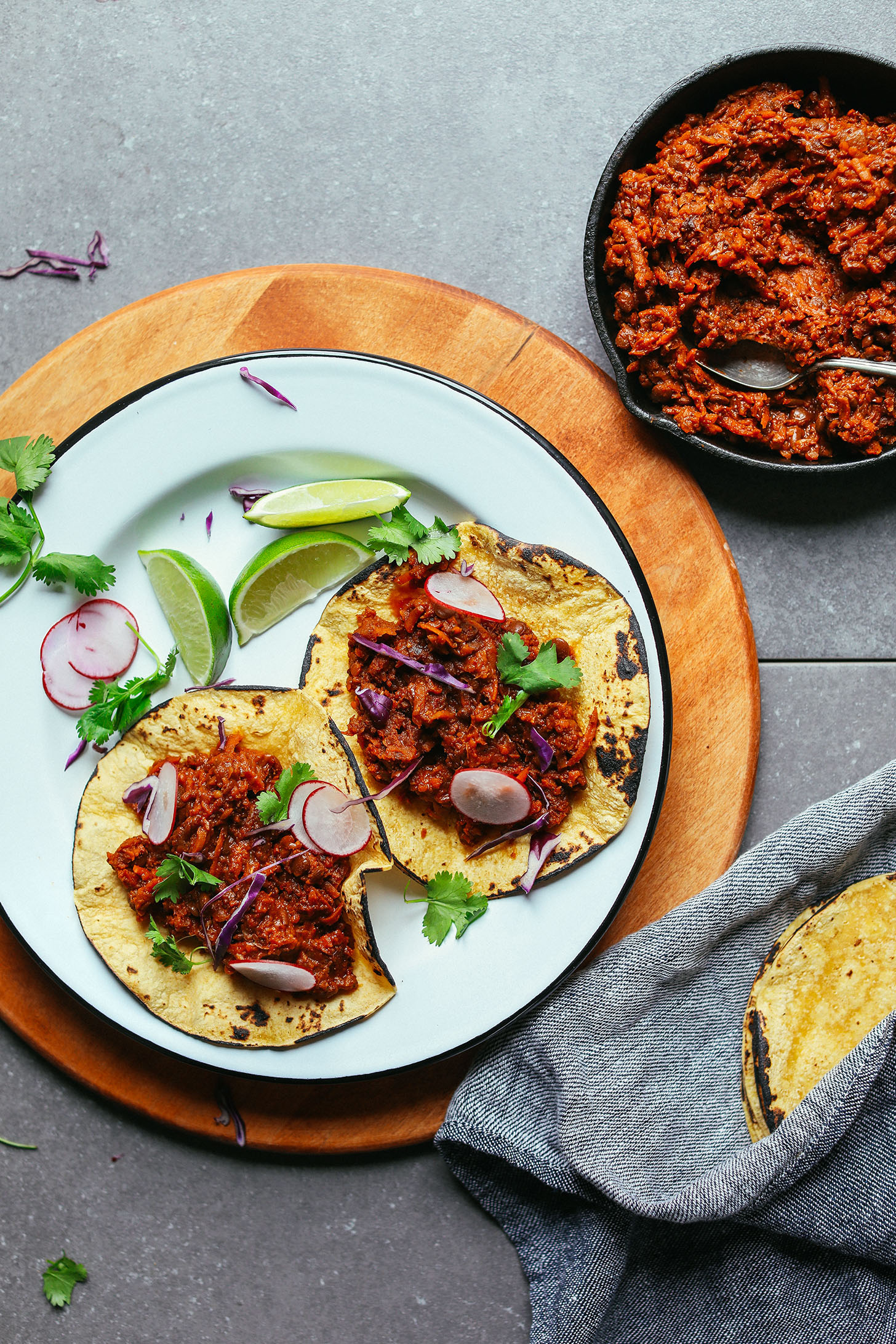 Plate with corn tortillas filled with Vegan Barbacoa for healthy plant-based tacos