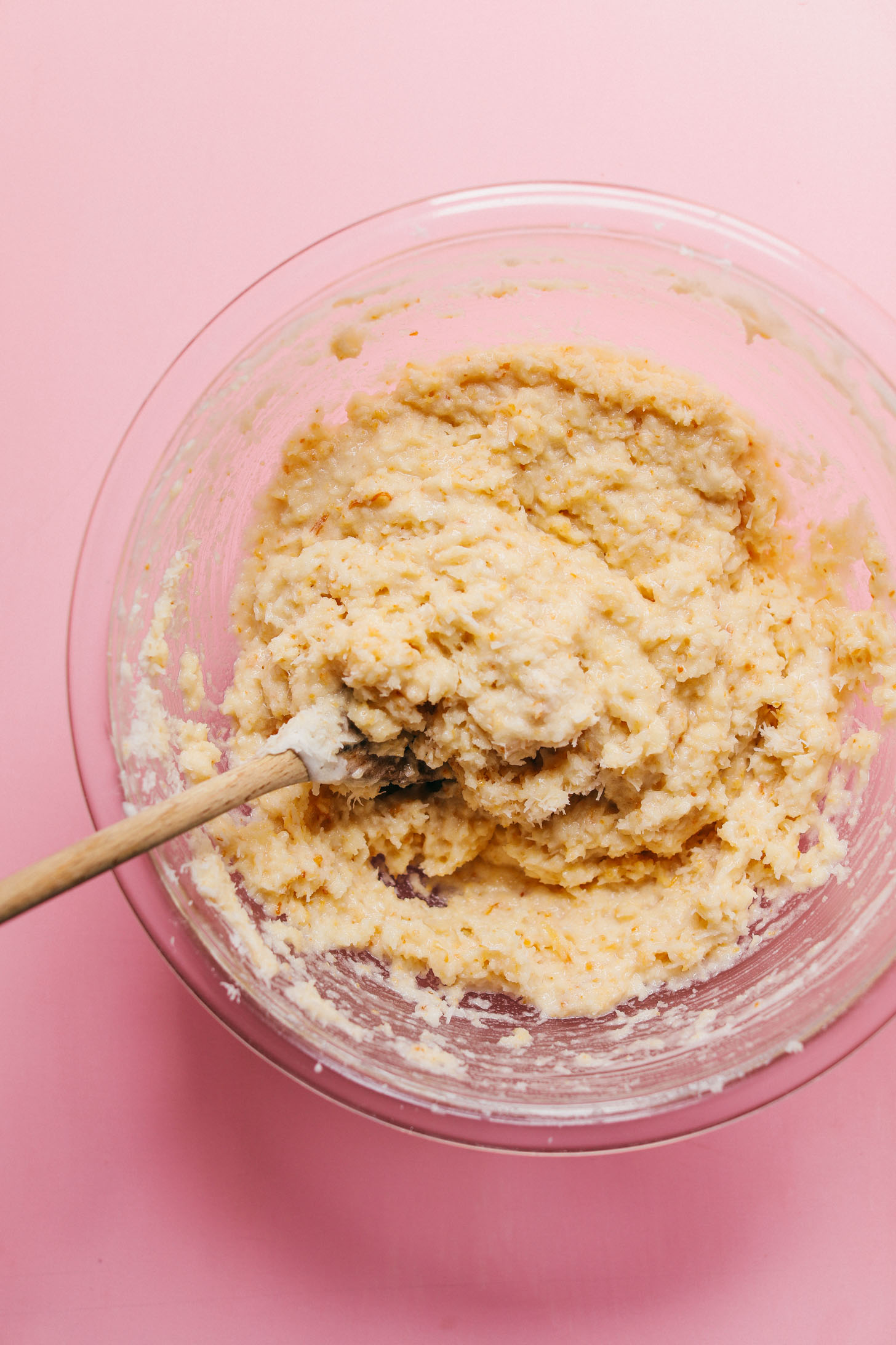 Stirring together ingredients for Crispy gluten-free Vegan Macaroons