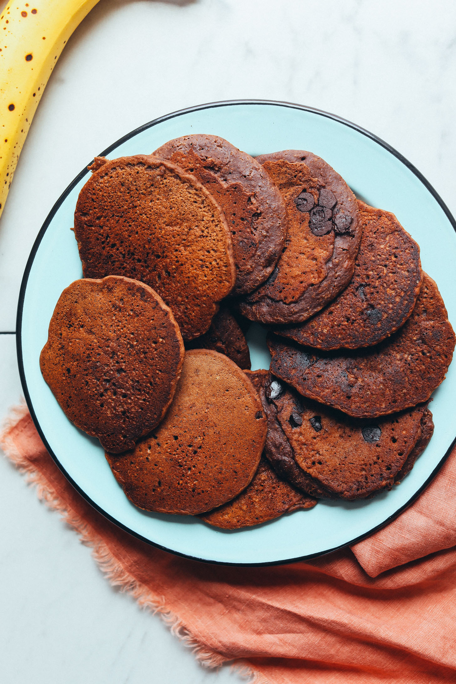 Plate of fresh Gluten-Free Vegan Chocolate Chocolate Chip Pancakes