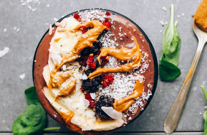 A big Peanut Butter & Jelly Acai Bowl for a plant-based breakfast