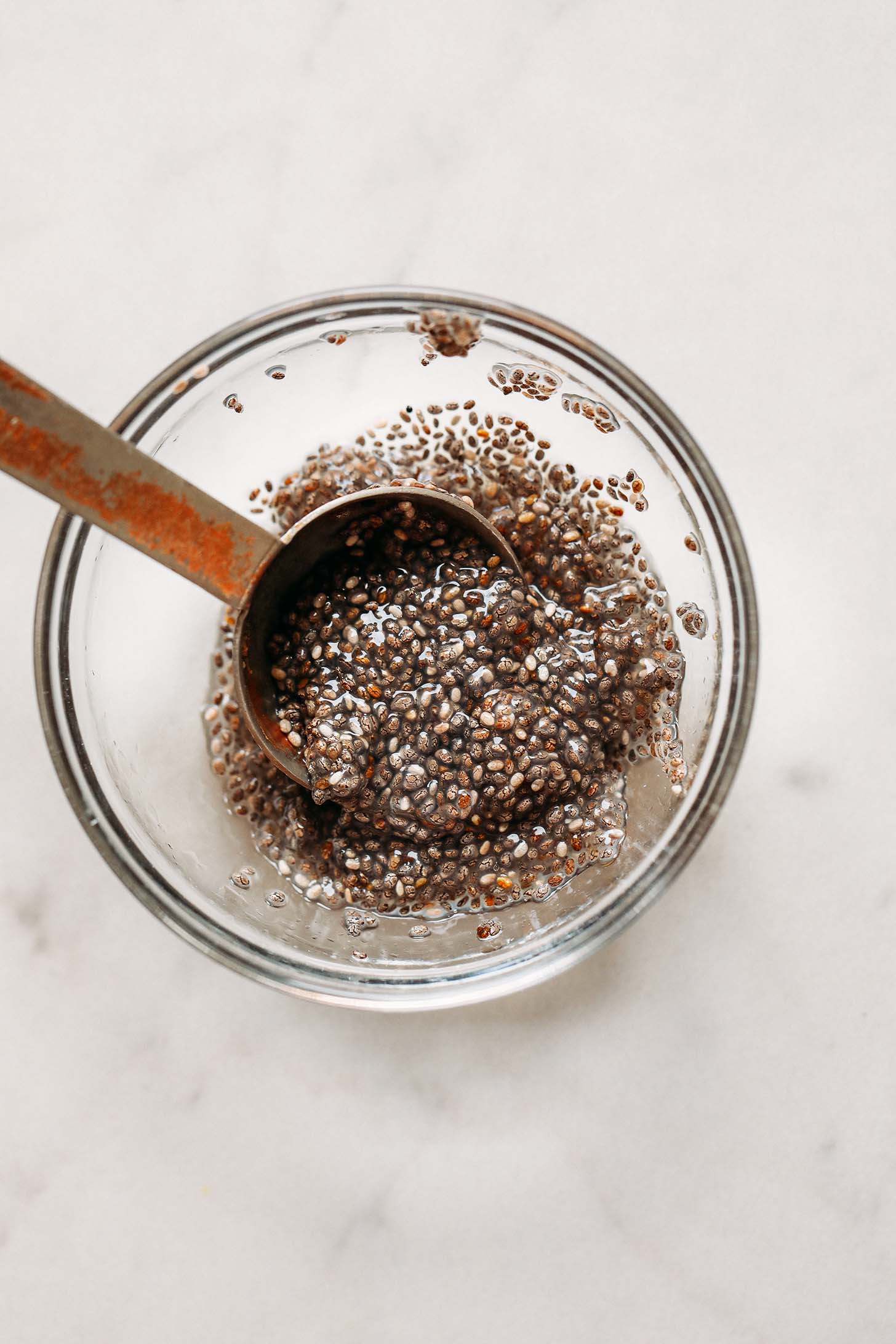 Bowl of chia seeds and water for a vegan egg substitute