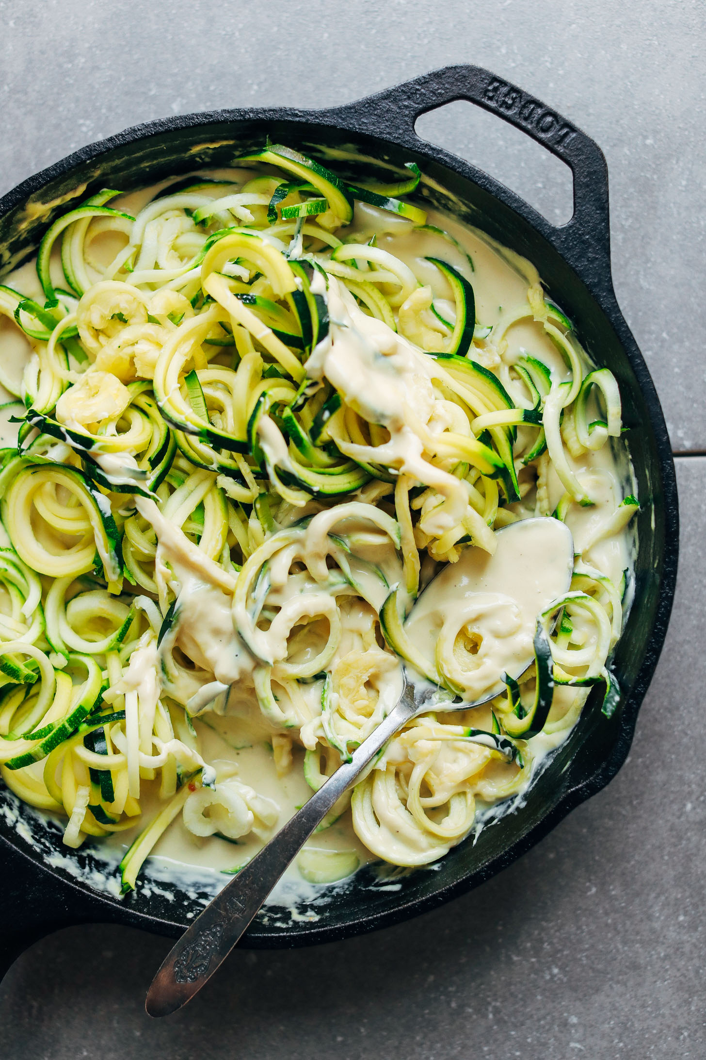 Cast iron skillet filled with creamy 30-minute Vegan Alfredo
