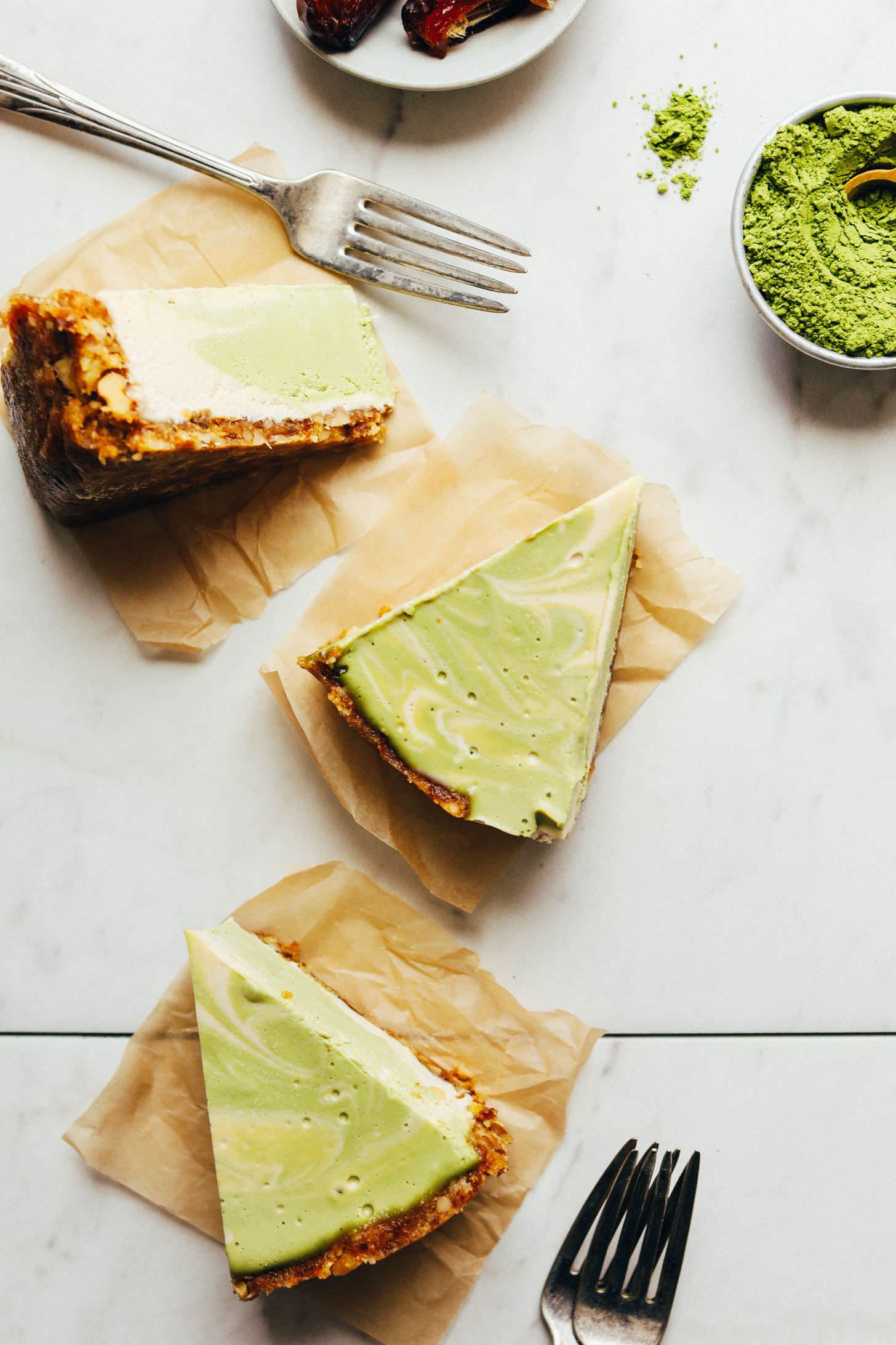 Slices of vegan gluten-free Matcha Swirl Cheesecake