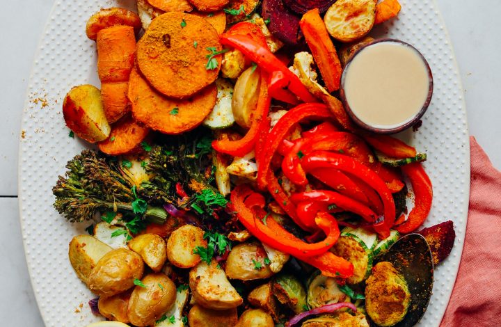 Platter of Oil-Free Roasted Vegetables with tahini and lemon for serving