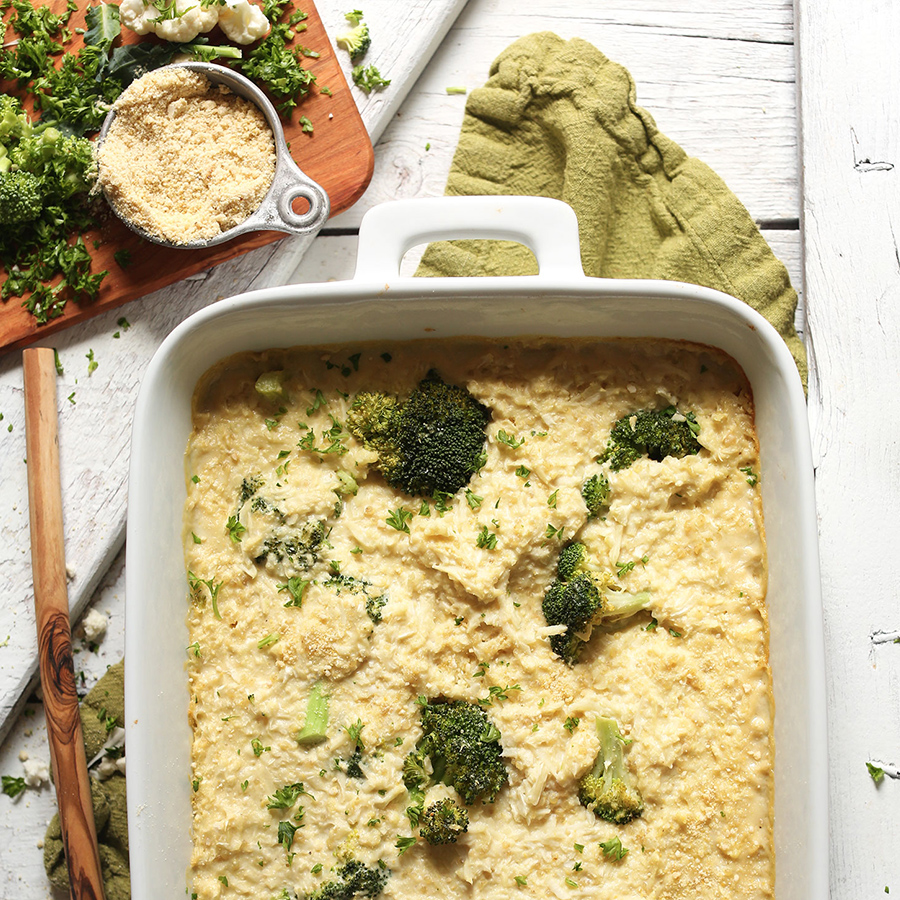 Baking pan filled with a batch of our Cheesy Cauliflower Rice Broccoli Bake for a simple vegan dinner
