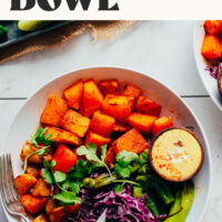 Overhead photo of a bowl of our vegan butternut squash bowl with jalapeño queso