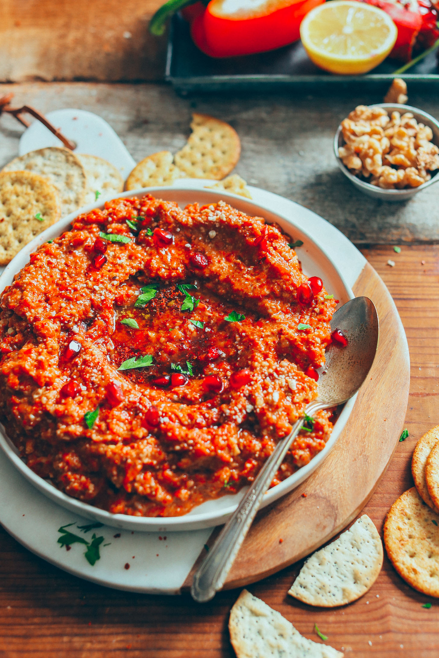 Smoky, spicy, and slightly sweet Gluten-Free Muhamarra Dip with gluten-free crackers