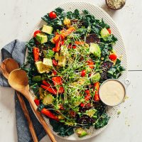 Platter filled with our healthy Loaded Kale Salad recipe