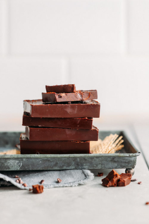 Stack of our favorite rich and creamy DIY Vegan Dark Chocolate bars