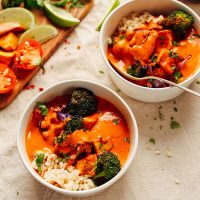 Two bowls of our Rich Red Curry served over brown rice