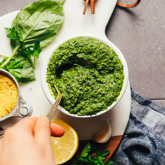 HEALTHY Super Green Vegan Pesto! BIG flavor, 10 minutes, 1 bowl, SO delicious. #vegan #glutenfree #plantbased #sauce #pesto #greens #minimalistbaker #recipe