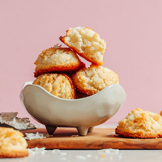 Bowl piled high with a batch of Gluten-Free Vegan Coconut Snowball Cookies