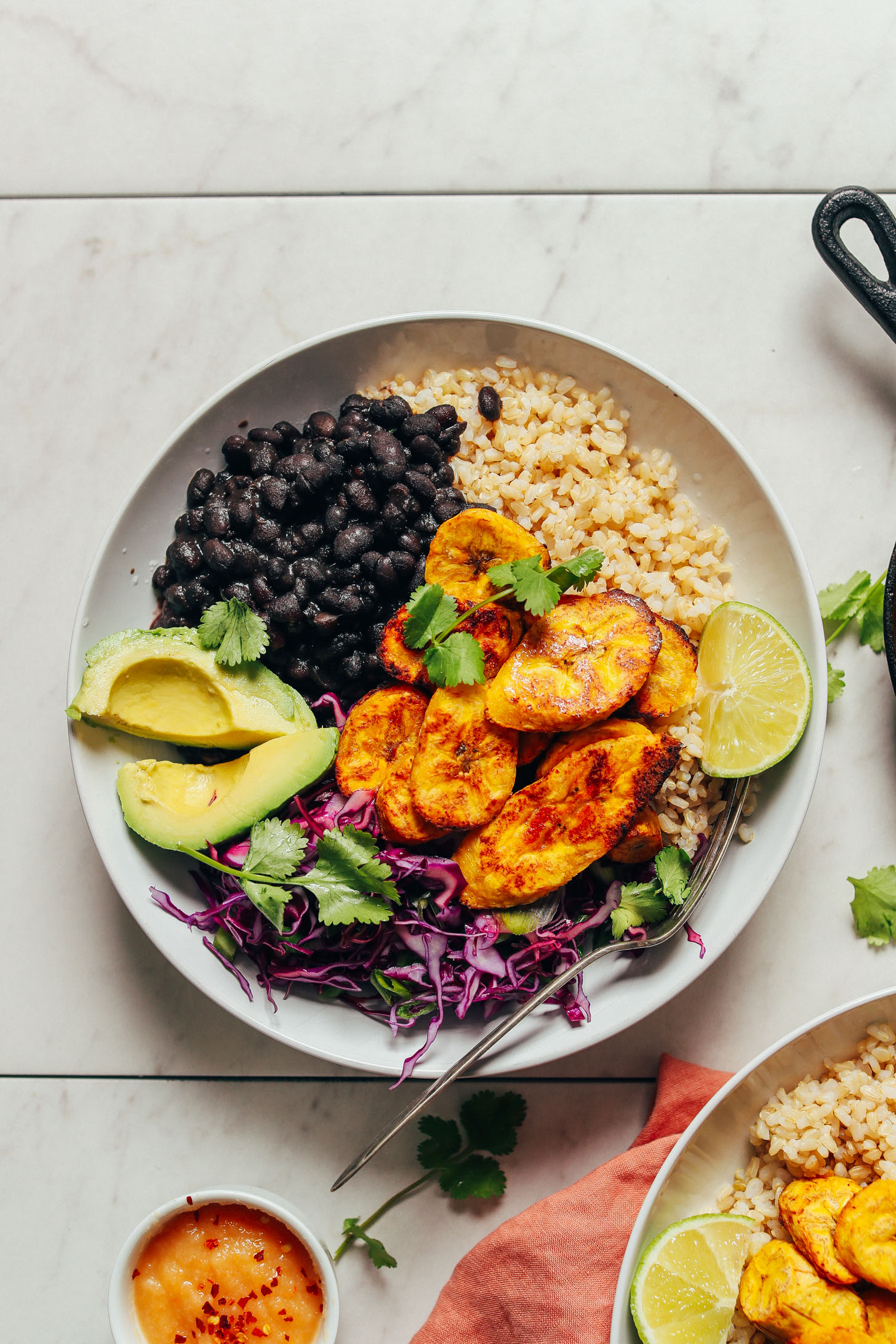 Fiber- and protein-rich ingredients make up this meal of Black Bean Plantain Bowls displayed here