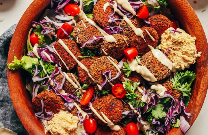 Big bowl of fresh vegetables and Black Bean Quinoa Falafel for a delicious gluten-free plant-based meal
