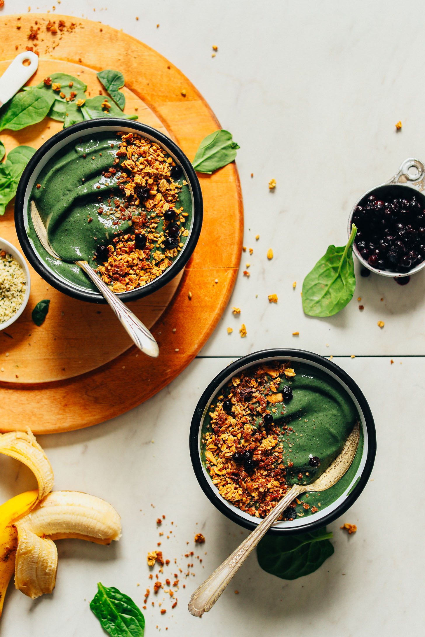 Two Peanut Butter Banana Super Green Smoothie Bowls for an antioxidant-packed vegan breakfast
