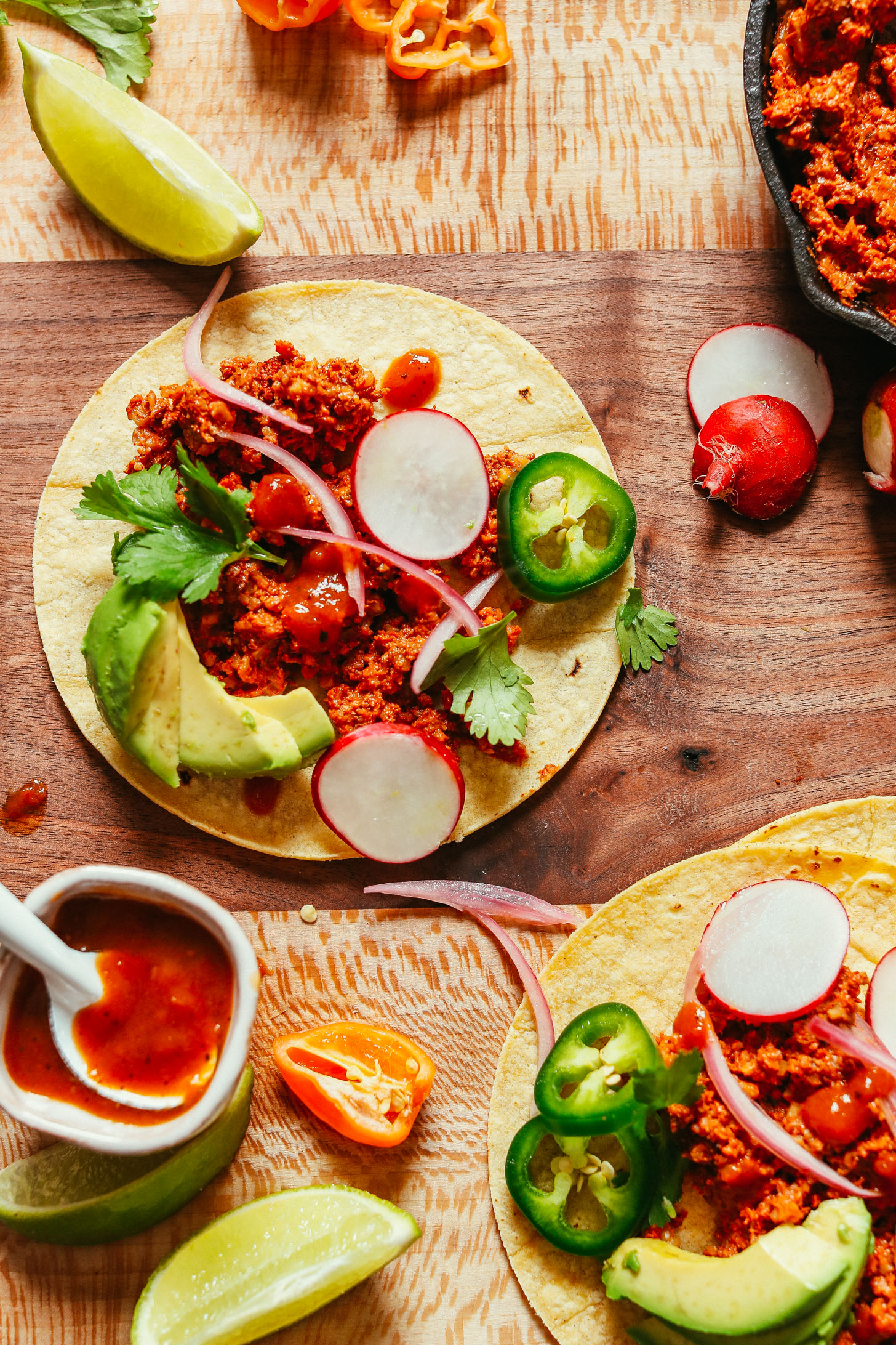 Tortillas topped with amazing Vegan Taco "Meat" inspired by Mexican flavors