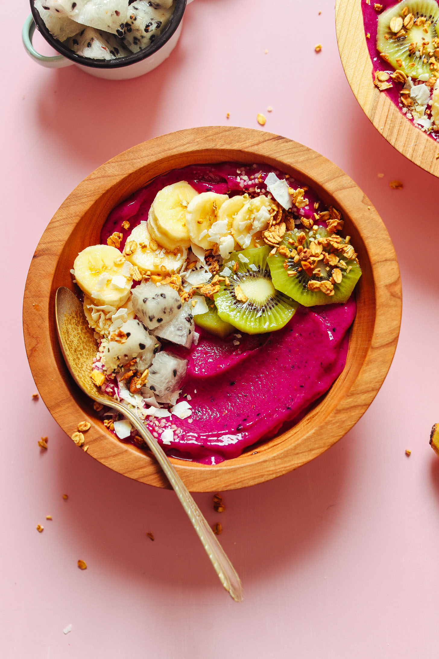 Wood bowl filled with our delicious Dragon Fruit Smoothie Bowl recipe