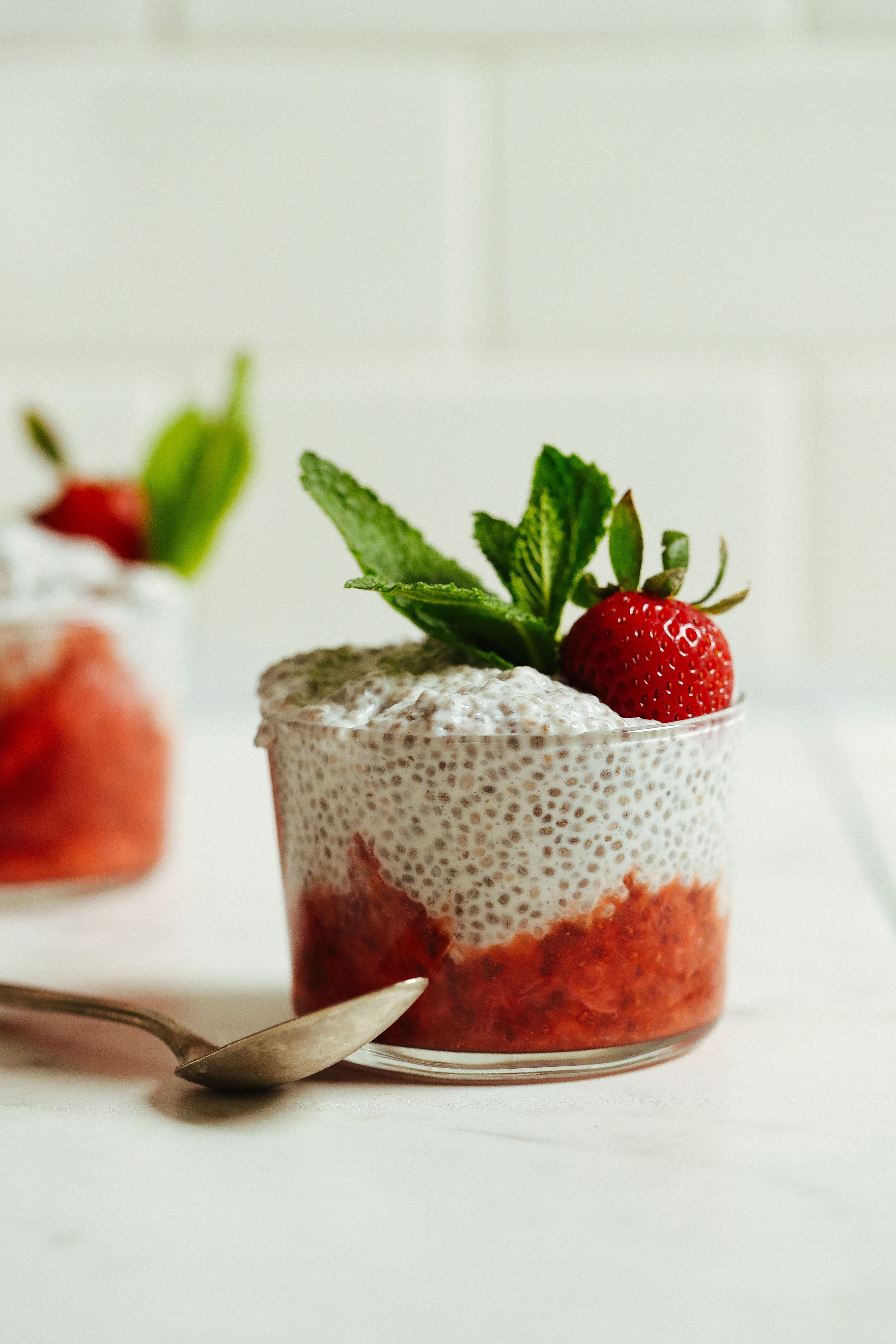 Berry compote with chia pudding a fresh strawberry and fresh mint
