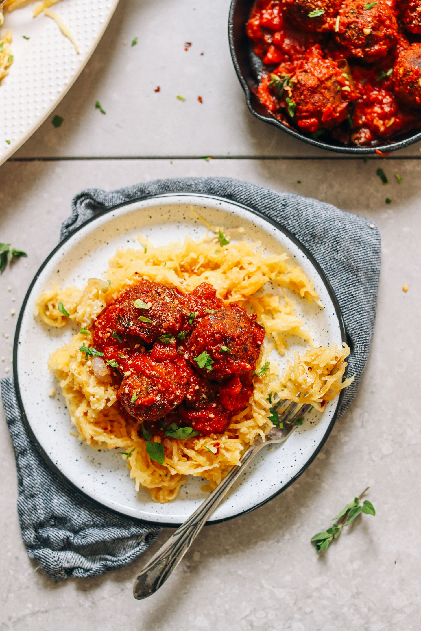 Dinner plate with Cheesy Spaghetti Squash Pasta for a gluten-free vegan meal