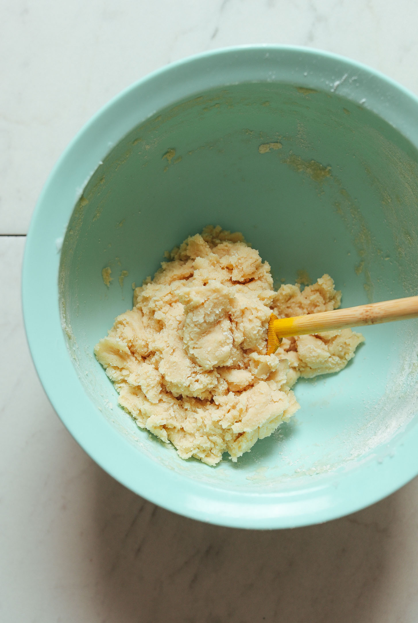 Mixing bowl with freshly stirred Vegan Gluten Free Vanilla Wafer dough