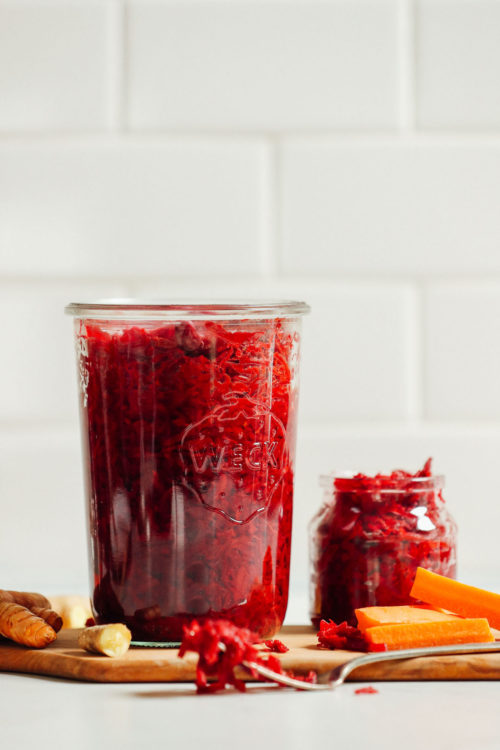 Jars filled with our tangy healthy homemade sauerkraut recipe