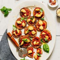 Platter of mini eggplant pizzas