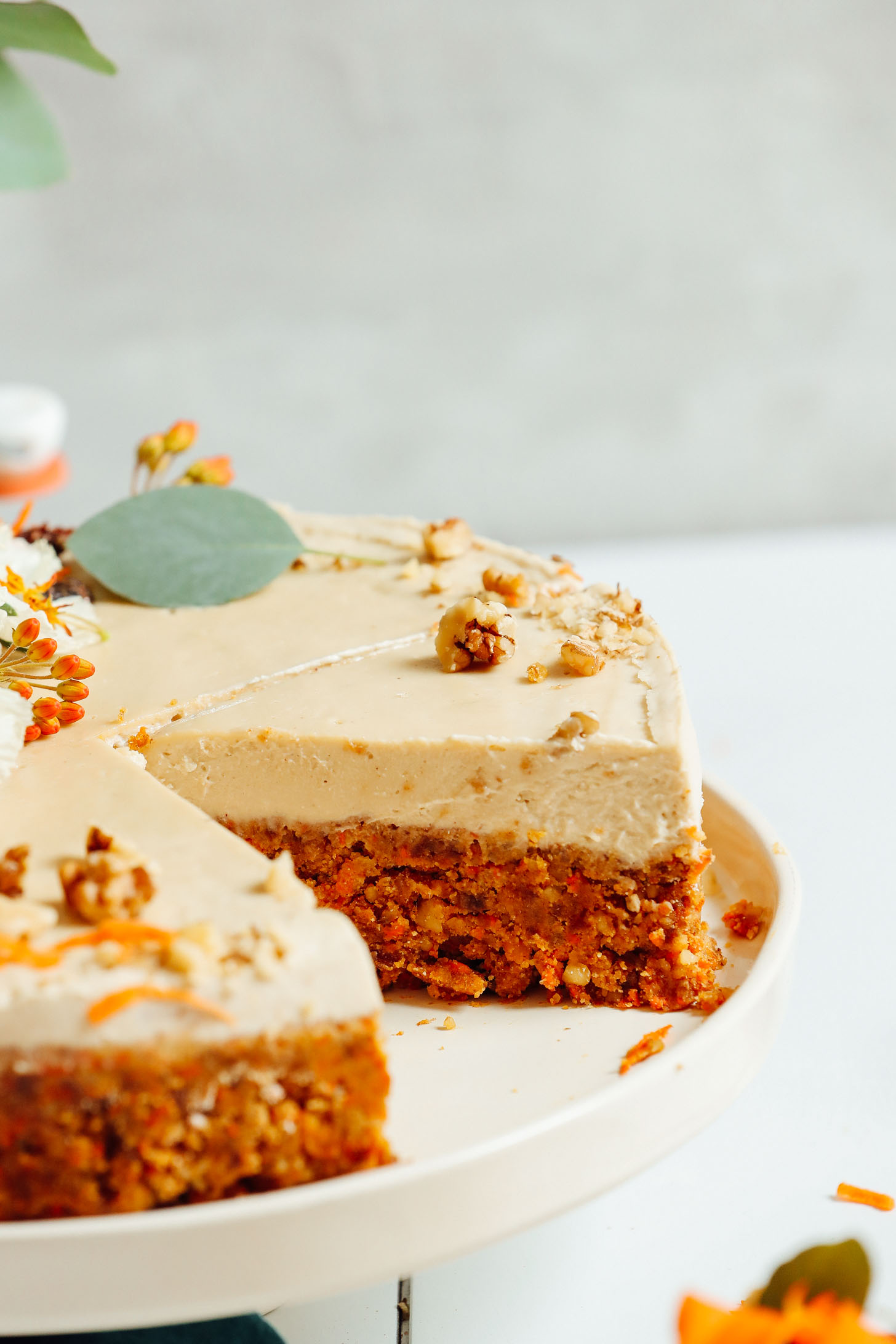 Raw Vegan Carrot cake with a slice removed
