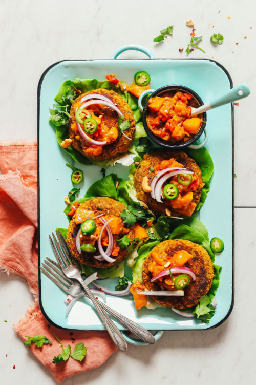 Platter filled with Curried Chickpea Burgers for a delicious gluten-free vegan meal