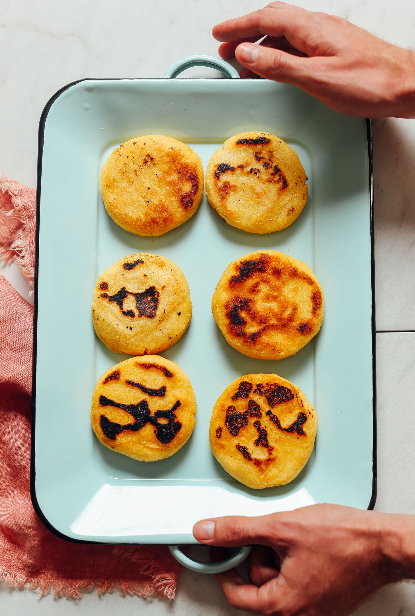 Tray of freshly cooked perfect homemade Arepas