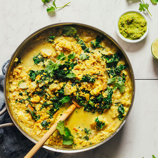 Big pan of Cauliflower Dal Green Curry packed with fresh greens