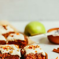 Slices of carrot apple snack cake on plates