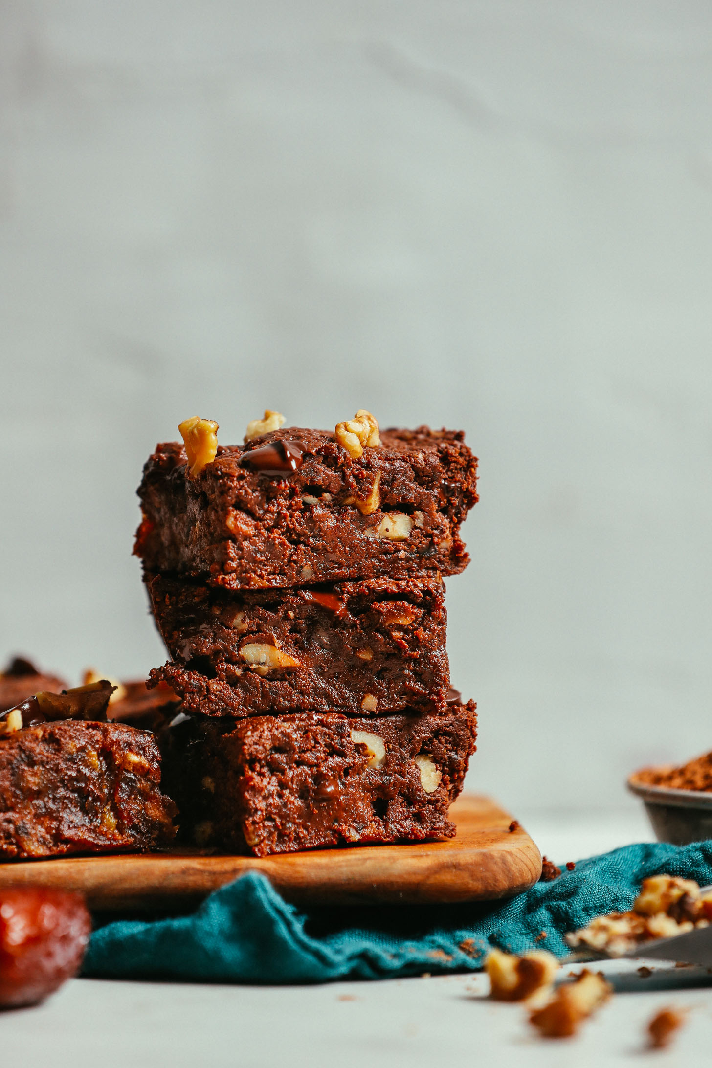Stack of easy vegan brownies made with dates and walnuts