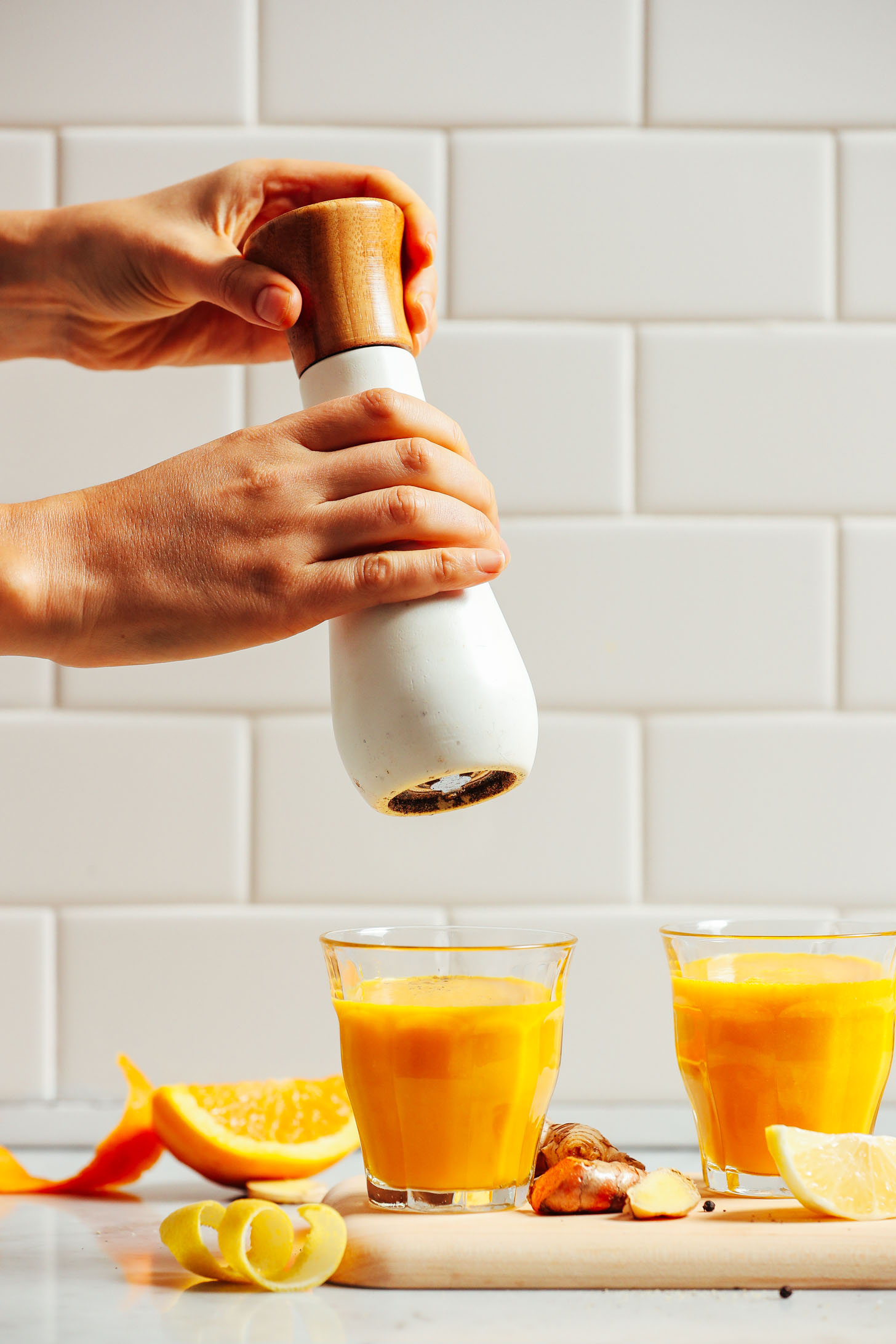 Adding black pepper to our Turmeric Wellness Shots to boost its healing properties