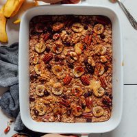 Baking dish of Chocolate Chip Banana Baked Oatmeal made with pecans